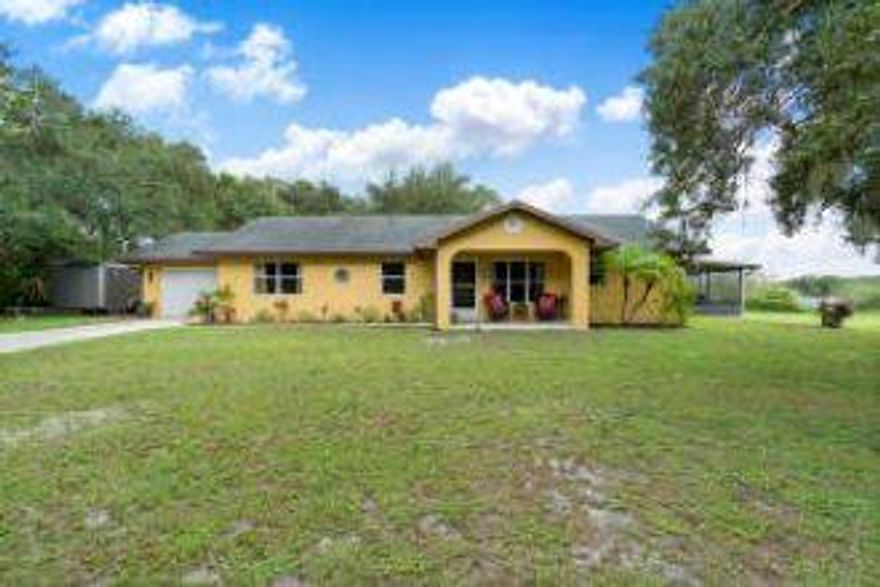 YOU HAVE FOUND A PIECE OF HEAVEN. SITUATED ON 1.73 ACRES THIS NO RESTRICTIONS PROPERTY HAS UNLIMITED POSSIBILITIES. THE HOME HAS BEEN COMPLETELY UPDATED WITH GRANITE, FLOORING, PAINT, IMPACT WINDOWS, AND AN AMAZING VIEW ON THE ENCLOSED PATIO OF THE POND AND PRESERVE! ENJOY A NICE PIECE OF OLD FLORIDA CHARM!  ADJACENT PROPERTY 5155 TOZOUR ALSO FOR SALE BY SAME SELLER FOR $174,900