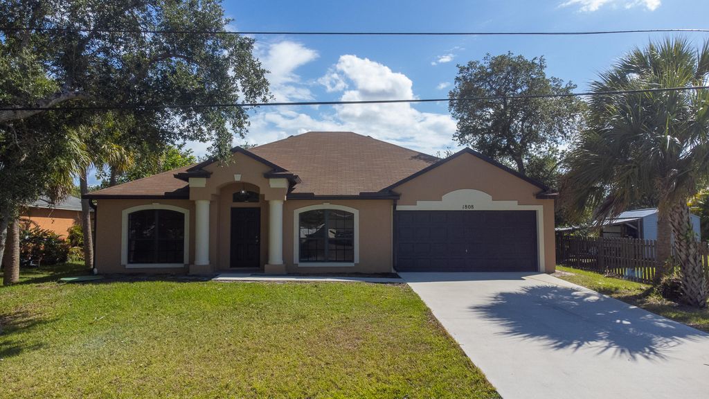 Photo of 1808 SW Bradway Lane, Port Saint Lucie, FL 34953 (MLS # R10800282)