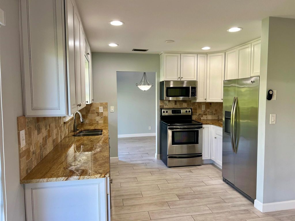 Photo of 4392 Colette Drive, Tequesta, FL 33469 (MLS # R11107497)