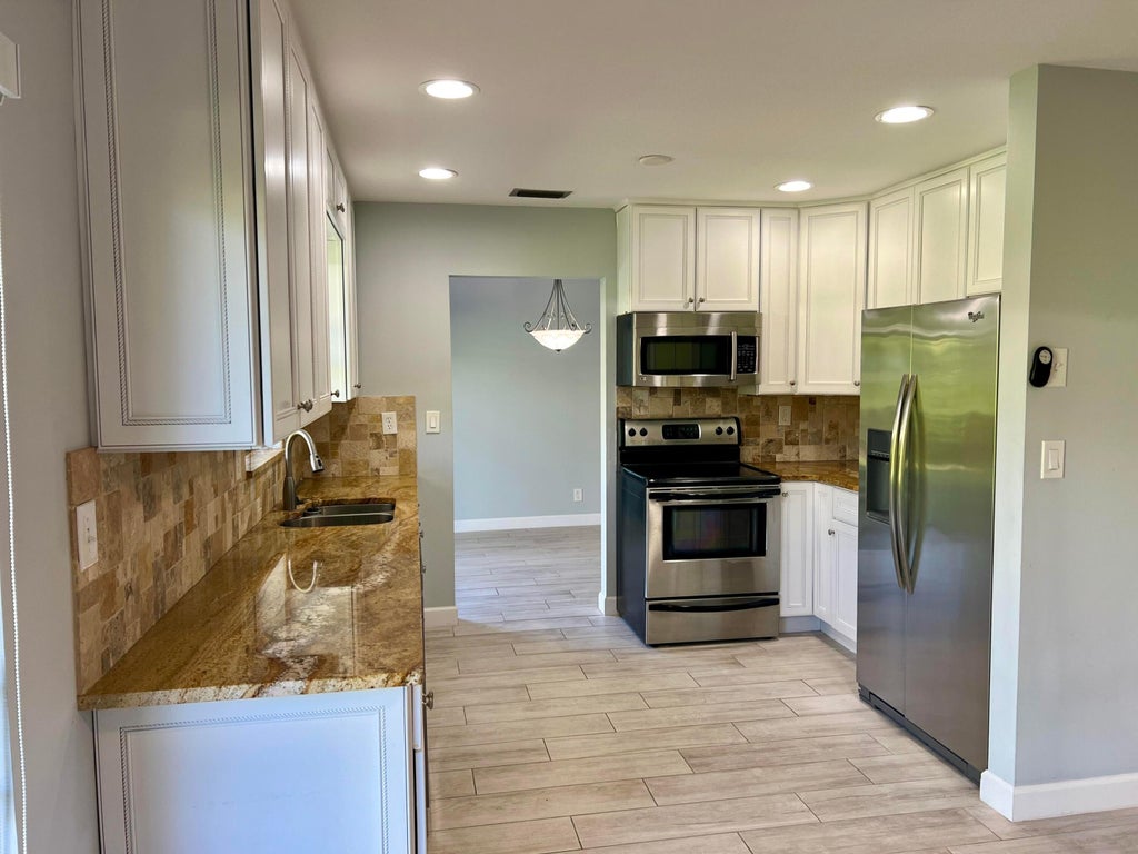 Photo of 4392 Colette Drive, Tequesta, FL 33469 (MLS # R11107497)