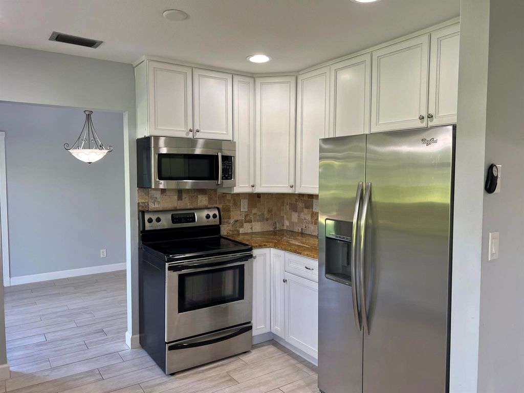 Photo of 4392 Colette Drive, Tequesta, FL 33469 (MLS # R11107497)