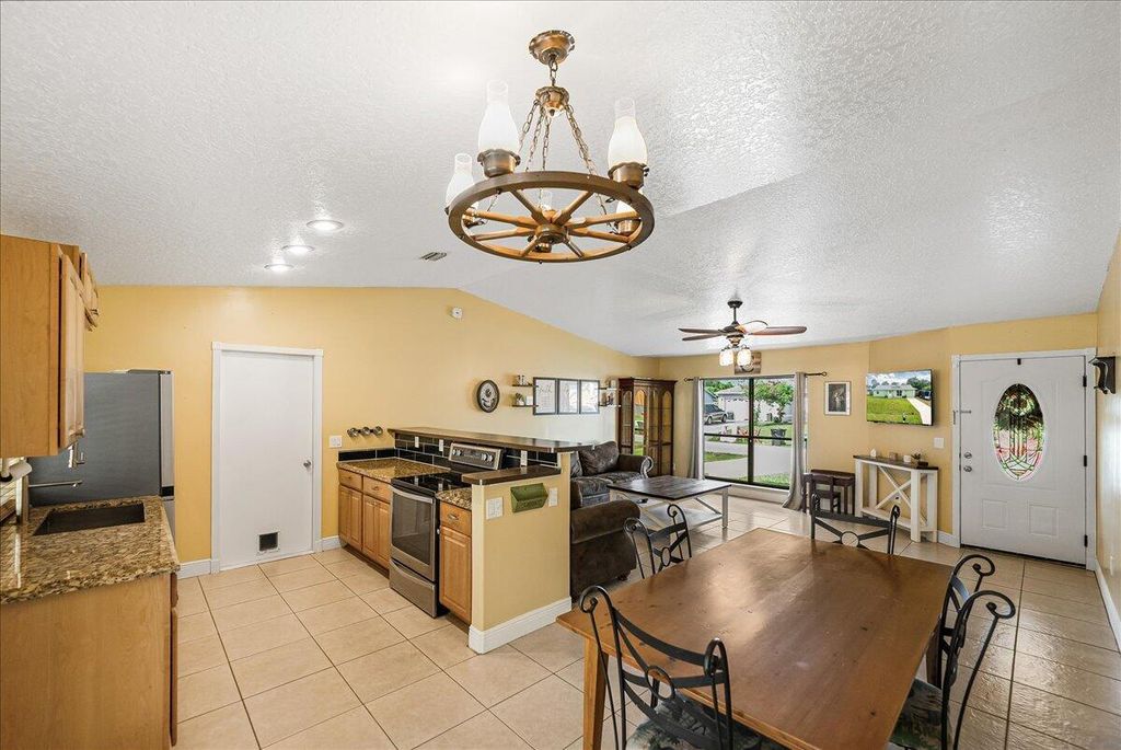 Photo of 452 SW David Terrace, Port Saint Lucie, FL 34953 (MLS # R11037388)
