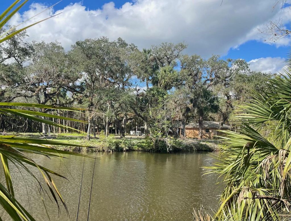 Photo of 1909 Old River Road, Fort Pierce, FL 34945 (MLS # R11144460)