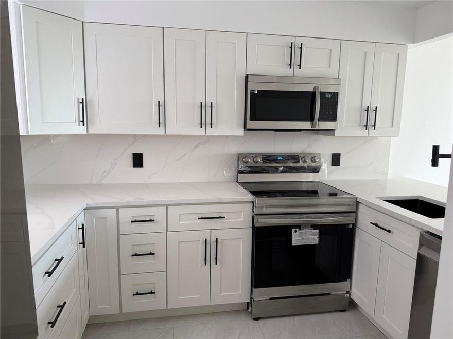 Welcome to your beautifully remodeled 4th-floor oasis! This spacious 2-bedroom, 2-bath condo overlooks a peaceful canal and has been tastefully updated . Enjoy cooking in the remodeled kitchen, featuring modern cabinetry, sleek countertops, and all stainless steel appliances. Both bathrooms have been fully renovated with contemporary finishes, and stylish tile flooring runs throughout the entire unit. The well-maintained community offers great amenities, including sparkling pools. Located just steps from scenic parks, this move-in ready home combines comfort and tranquil water views. Don't miss out! Bring all offers. Call LA for showings ,On lock box, Dawn 954-309-3736 . See attachment for HOA application and rules.