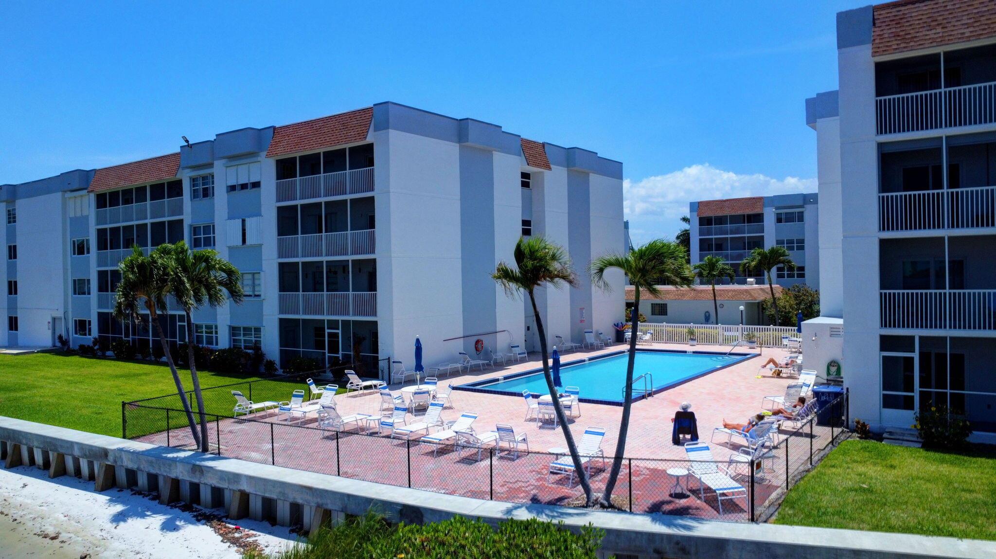 Welcome to Palm Lake - Your Waterfront Retreat in the Heart of Palm Beach County!Discover this hidden gem nestled along the Intracoastal Waterway in Lake Worth Beach. This boutique community. has just 142 residences, and offers water and/or pool views from most units, creating a peaceful, picturesque setting.This updated first-floor condo features a modern kitchen with granite counter tops, stylish tile flooring, and a screened patio perfect for enjoying Florida's breezy evenings. Enjoy the convenience of direct access to both the heated pool and the parking area -- no stairs or elevators needed! 2023 W/H. 2018 A/C. One assigned parking space. Additional storage included.