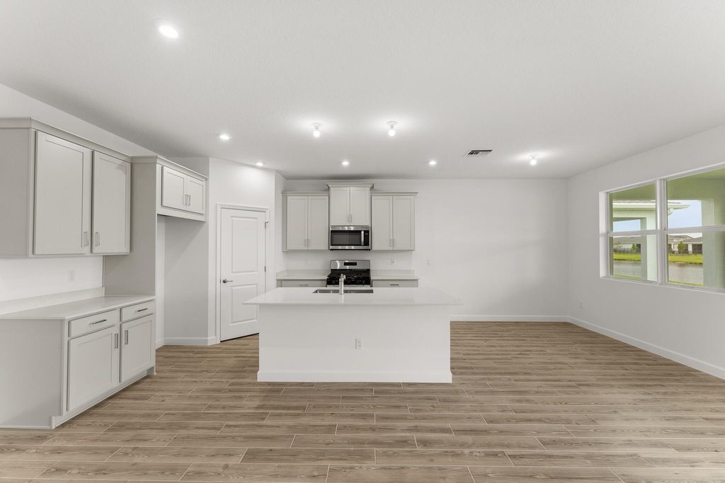 Photo of 14440 SW Ellison Drive, Port Saint Lucie, FL 34987 (MLS # R11131276)