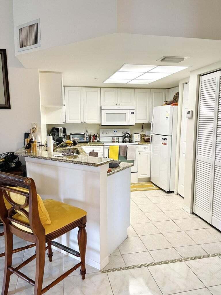 Photo of 300 CRESTWOOD Court N #309, Royal Palm Beach, FL 33411 (MLS # B26067972)