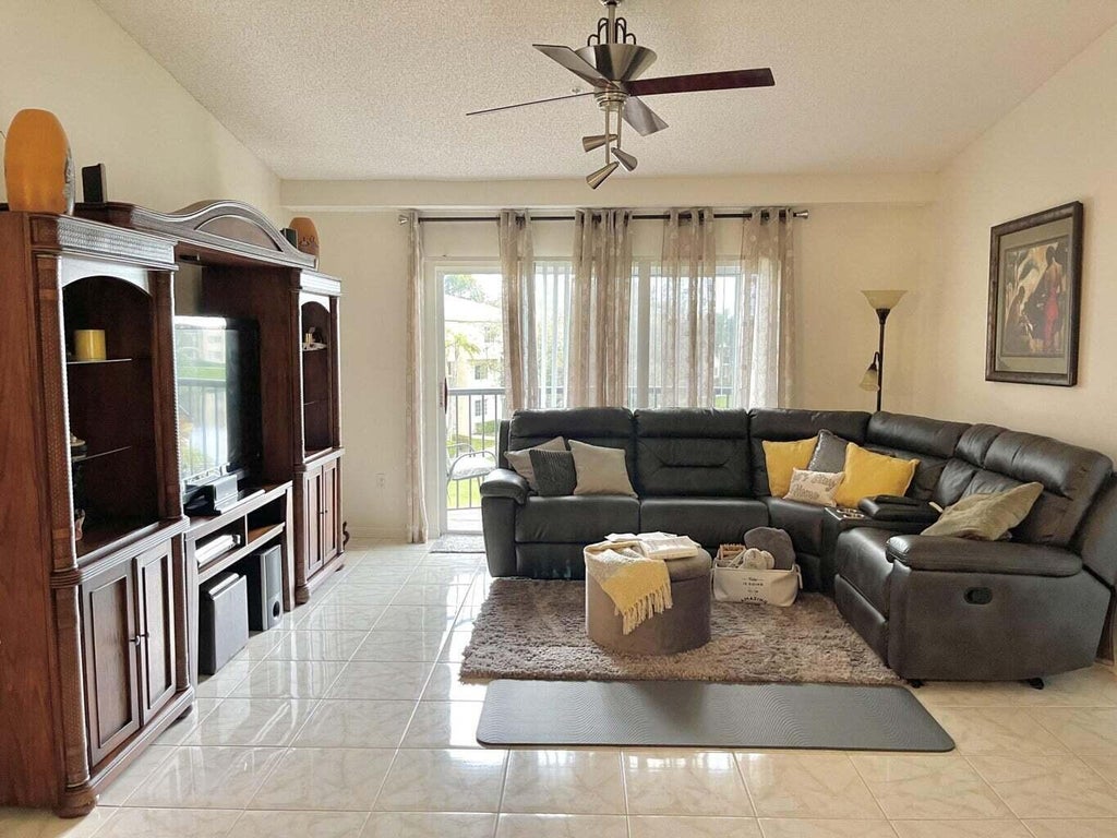 Photo of 300 CRESTWOOD Court N #309, Royal Palm Beach, FL 33411 (MLS # B26067972)
