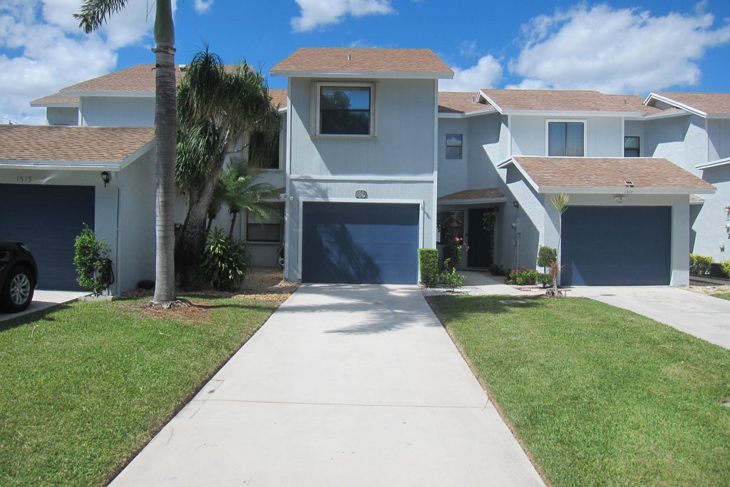 Photo of 1517 Woodbridge Lakes Circle, West Palm Beach, FL 33406 (MLS # B26063845)