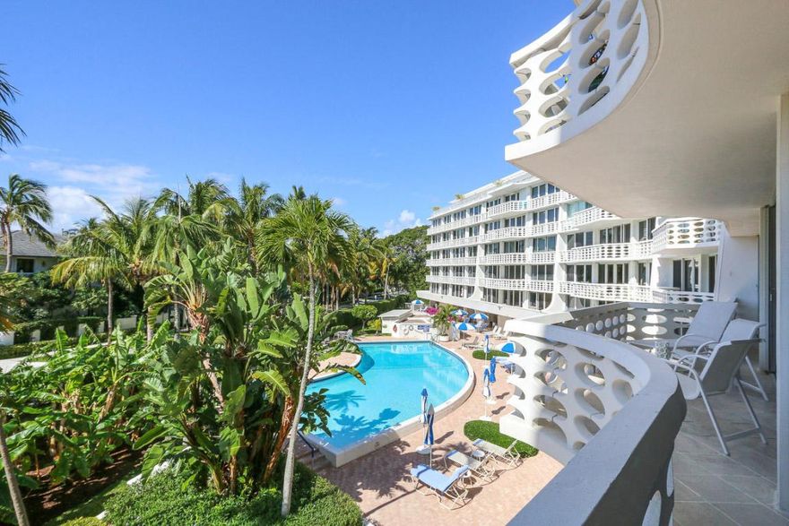 Bright, south-facing 2 bedroom/2.5 bathroom. 2 valeted parking spaces. Elegant Palm Beach style decor. Marble flooring. Direct oceanfront, full-service building. Views of the heated pool. Steps to shopping and The Breakers Resort.