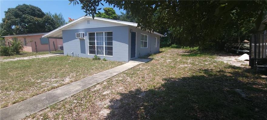 This home could be perfect for a first time buyer! Cute remodeled 2 bedroom 1 one bath with all tile throughout the home. Concrete block home in a well established neighborhood. Bring your boat or RV there are no HOA fees or restrictions. All room sizes are approximate and should be verified by buyer.