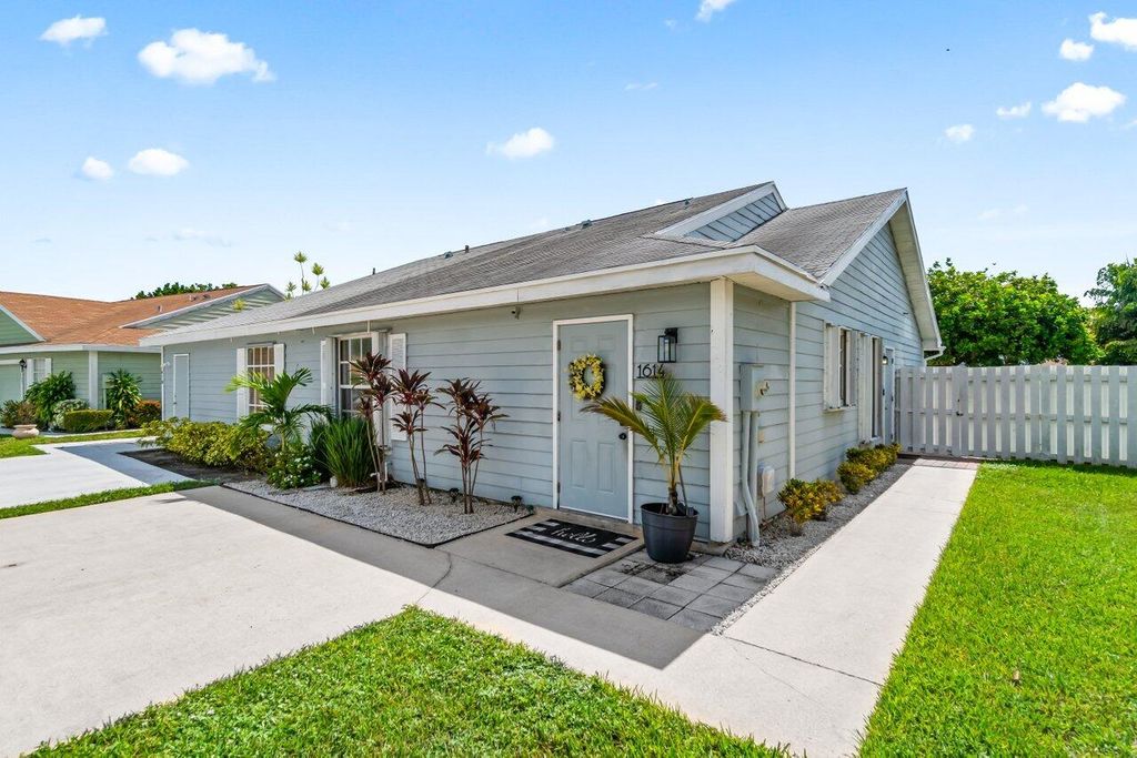 Photo of 1614 Royal Forest Court, West Palm Beach, FL 33406 (MLS # R11008797)