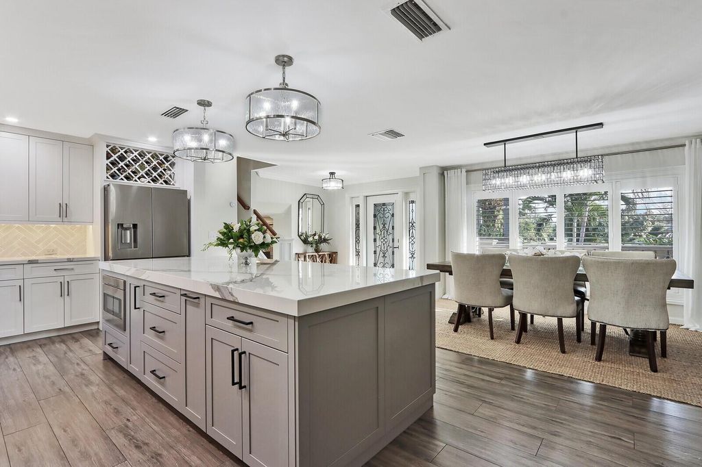 Photo of 22 Teach Road, Palm Beach Gardens, FL 33410 (MLS # R10960022)