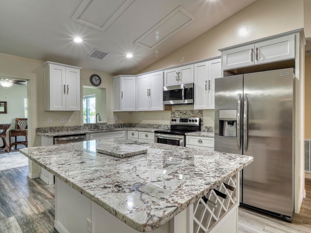 Photo of 4458 SW Athena Drive Drive Dr, Port Saint Lucie, FL 34953 (MLS # R10814198)