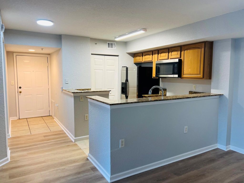 Photo of 231 SW Palm Drive #205, Port Saint Lucie, FL 34986 (MLS # R11025157)