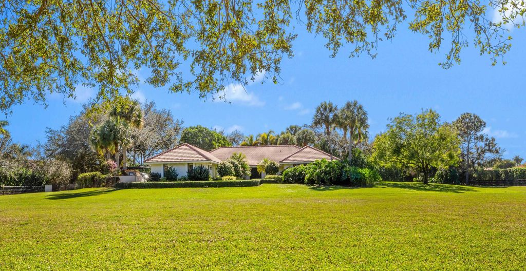 Photo of 15262 Natures Point Lane, Wellington, FL 33414 (MLS # R11157946)