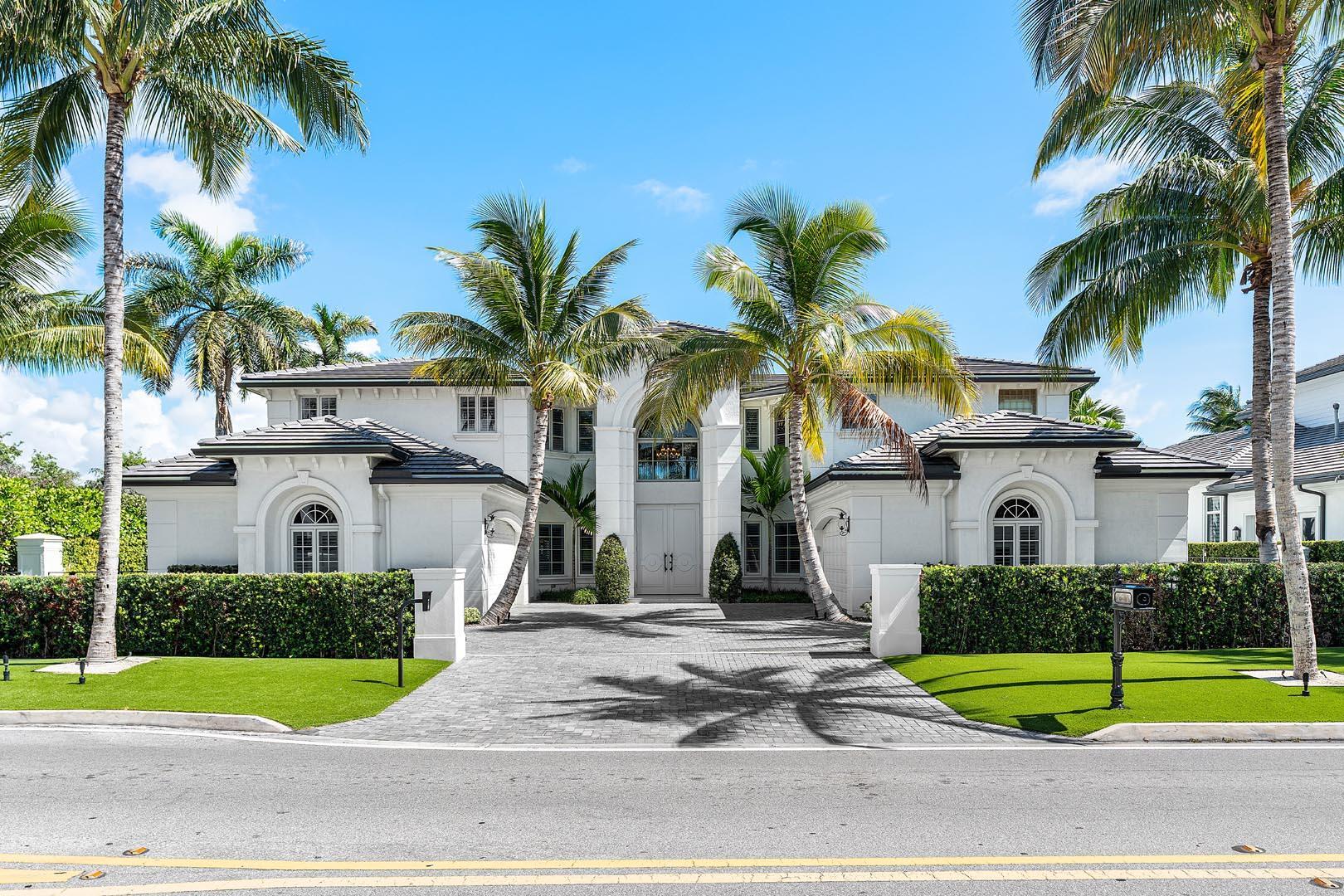 Beyond the gates of a private motor court, this six-bedroom golf course estate offers a lifestyle defined by elegance, privacy, and sweeping views of the Jack Nicklaus Signature Course. From the moment you arrive, the sense of quiet prestige is undeniable. Inside, light pours into the soaring two-story living room, where walls of glass dissolve the boundary between indoors and out. The chef's kitchen, outfitted with professional-grade appliances, becomes the heart of the home--its open layout flowing seamlessly into a sunlit dining space where conversations linger late into the evening by the two-sided fireplace.