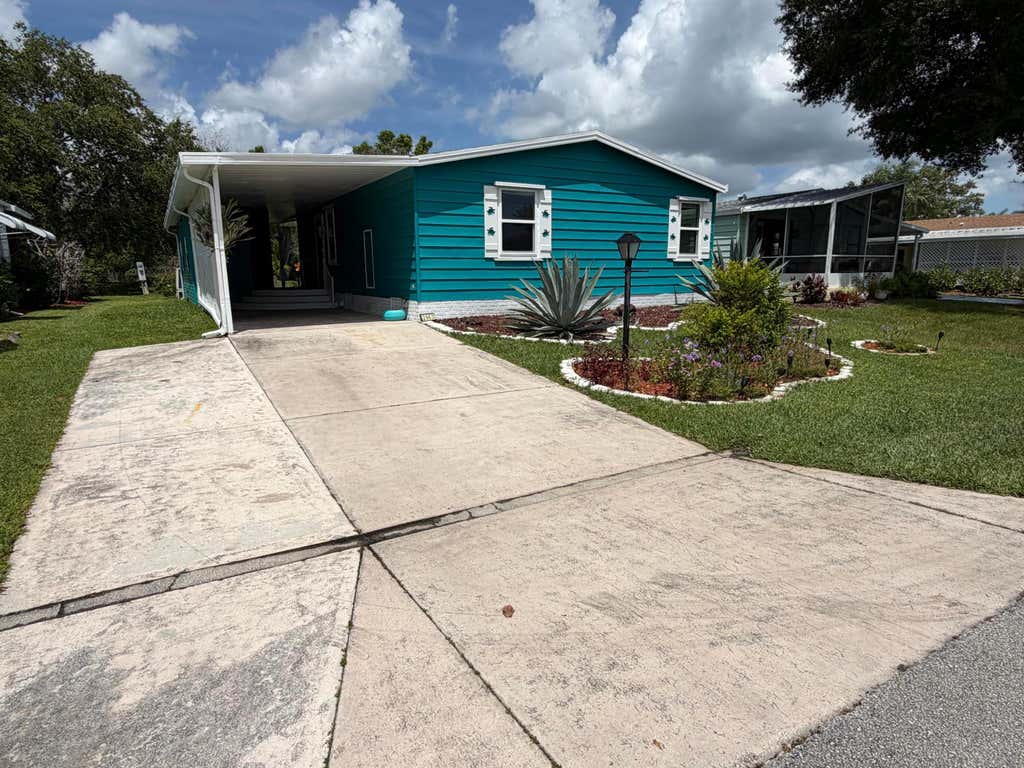 Photo of 2963 FIDDLEWOOD Circle, Port Saint Lucie, FL 34952 (MLS # B26060488)