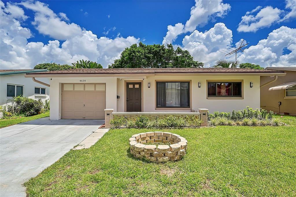 LOCATION, LOCATION, LOCATION, RIGHT BY THE TURNPIKE, AND MINUTES FROM I-95. THIS 2 BEDROOM 2 BATHROOM WITH A BONUS ROOM COULD BE A 3RD BEDROOM OR OFFICE. THIS FULLY AUTOMATED HOME, HAS ALL THE BELLS AND WHISTLES AND CAND BE OPERATED FROM YOUR PHONE. NEW ROOF 2024 NEW BATHROOM WITH STEAM SHOWER AND INTERCHANGABLE LIGHTS , NEW KITCHEN WITH GRANITE COUNTER TOP. NEW IMPACT WINDOWS AND DOOR 2024, LED AND RECESS LIGHT THROUGHOUT THE HOME. SECURITY CAMERA ALL AROUND THE HOME, SCREEN PATIO WITH JACUZZI. OWNER WILL INSTALL STAINLESS STEEL APPLIANCES PRIOR TO CLOSING. THIS IS A 55+ COMMUNITY.