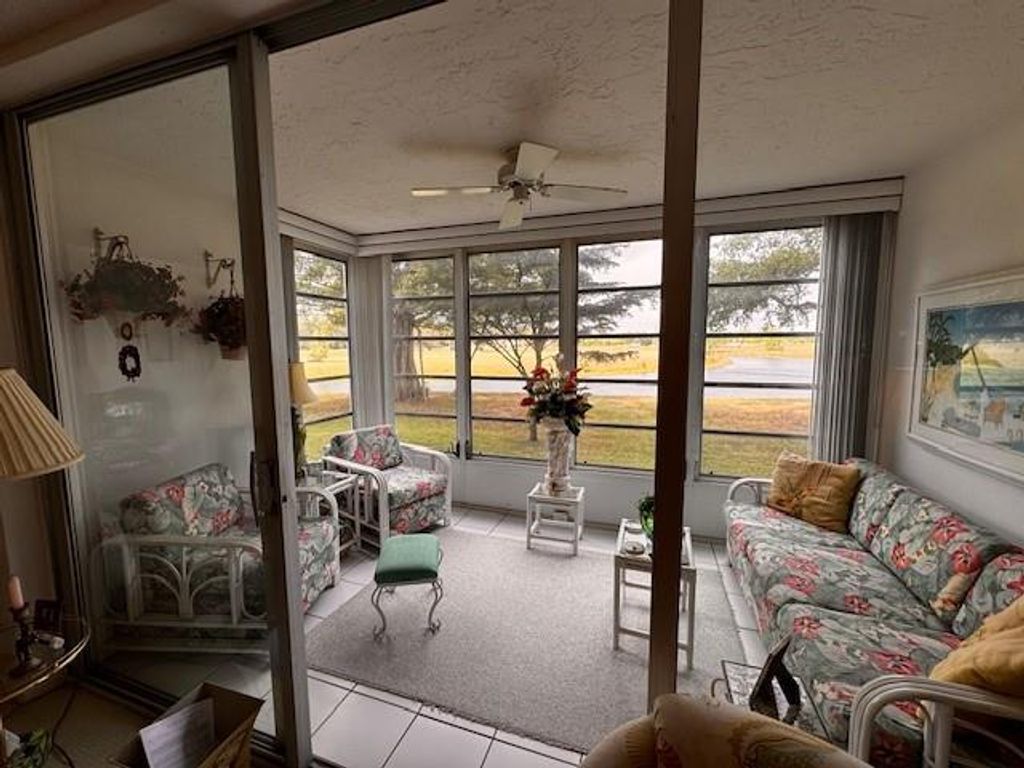 Photo of 3080 N Course Dr #204, Pompano Beach, FL 33069 (MLS # F10540124)