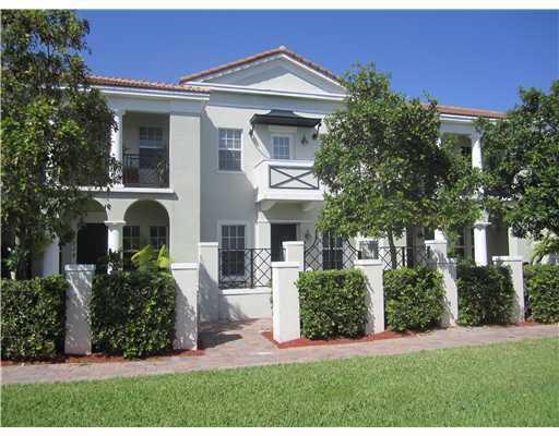Lovely 2 bedrooms plus den and loft townhouse with 2 car garage in East Boca with water views front(lake) and back (canal). Private, enclosed front yard which is maintained by the community. Easy access to guest parking and scenic jogging trail. Community is situated at the beginning of the El Rio Walking Trail. Loft upstairs, perfect for playroom, office or second living area, plus two bedrooms and a den/3rd bedroom. Cabinets in the garage providing additional storage. Master Bathroom w/Roman Tub and glass shower door, central vac, impact windows, high ceilings, courtyards, stainless steal appliances, maple cabinets & granite countertop. Heated community pool, club house, gym, playground. Located close to I-95, shopping and beaches. Great schools.