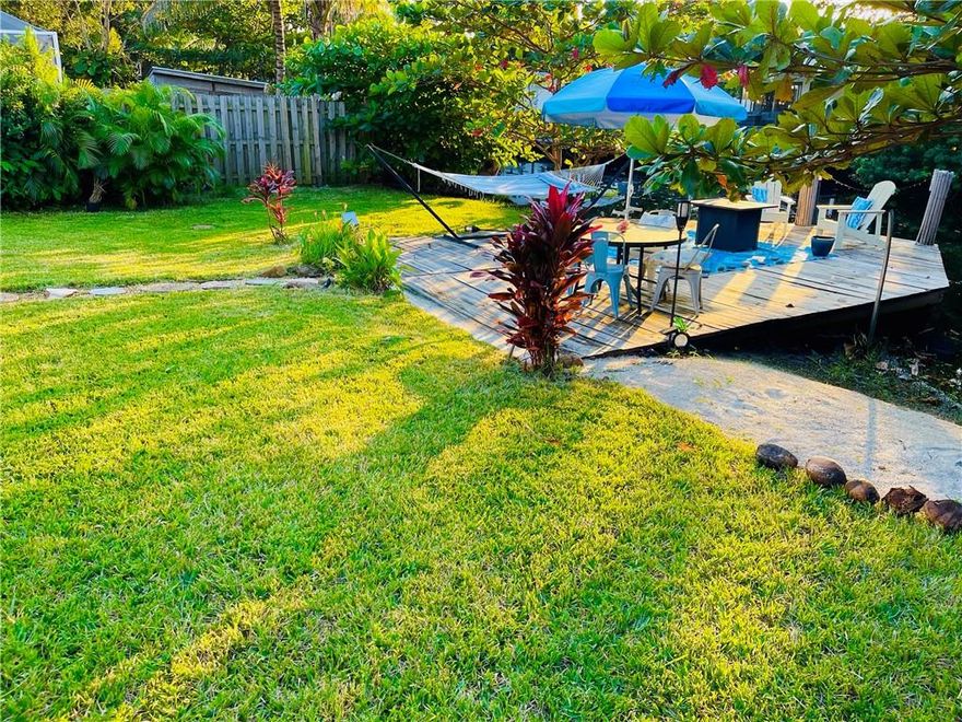 Great long term investment. Bring you boat and toothbrush to this OCEAN Access home with Garage! Great location close to airport and beach. Best canal of these isles, one fixed bridge, the widest of them. Furniture included worth over $20,000 if wanted, Jetski can be added additional! Florida living at it’s best. Large dock with mini sand beach and beautiful grassy fenced back yard to enjoy waterfront living. Plenty of parking and room for RV. Very nice Palm trees and delicious mango trees in front & lovely trees in back, creates a very peaceful feel. Big 300+ sqft dock. New construction down the street more likely to come. Great friendly street with good neighbors. Centrally located just minutes to the beach, Ft Laud/Hollywood Int'l Airport & downtown Ft Lauderdale Las Olas Blvd.