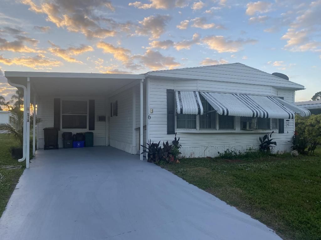 Photo of 6 El Morrow, Port Saint Lucie, FL 34952 (MLS # R10941399)