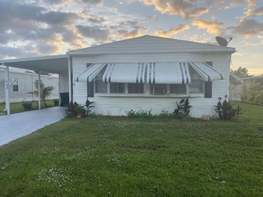 Photo of 6 El Morrow, Port Saint Lucie, FL 34952 (MLS # R10941399)