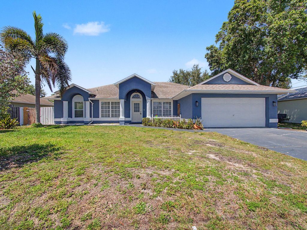 Photo of 1573 SW Aledo Lane, Port Saint Lucie, FL 34953 (MLS # B26025102)