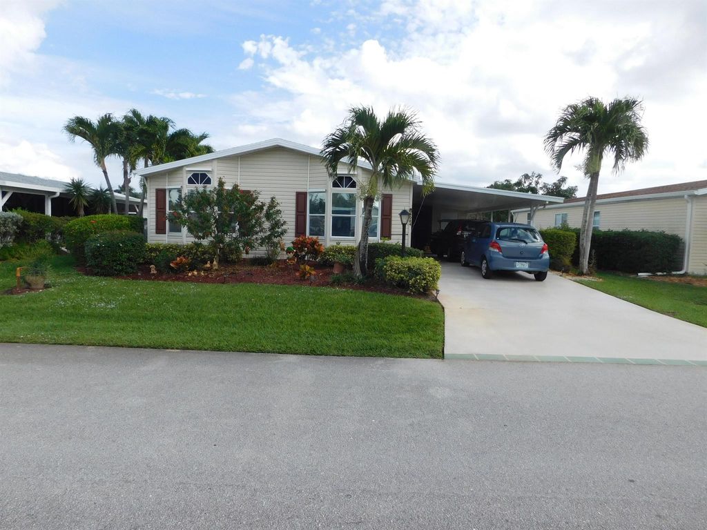 Photo of 8024 Meadowlark Lane, Port Saint Lucie, FL 34952 (MLS # R10941298)