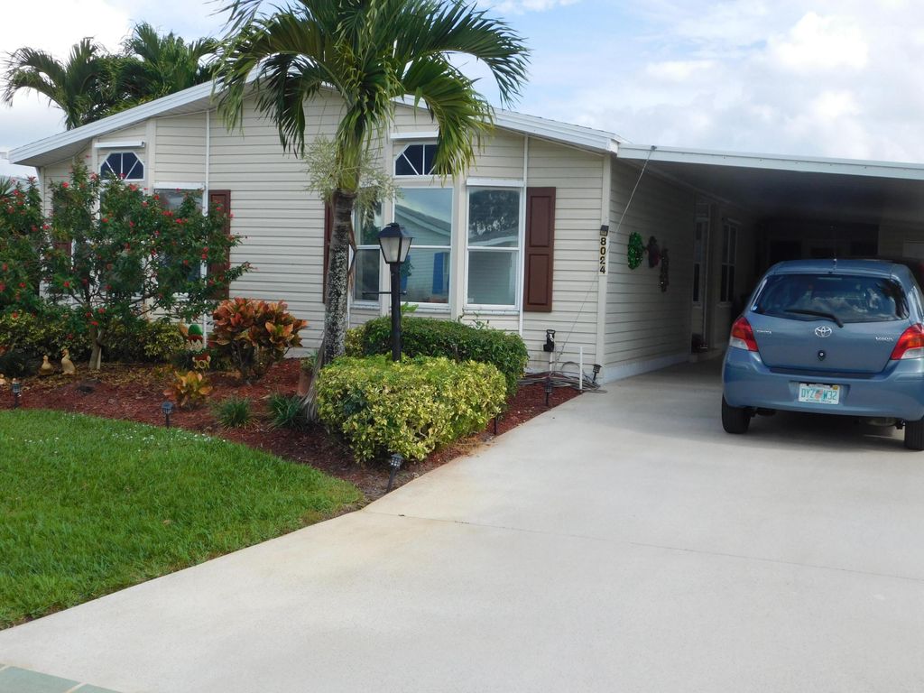 Photo of 8024 Meadowlark Lane, Port Saint Lucie, FL 34952 (MLS # R10941298)
