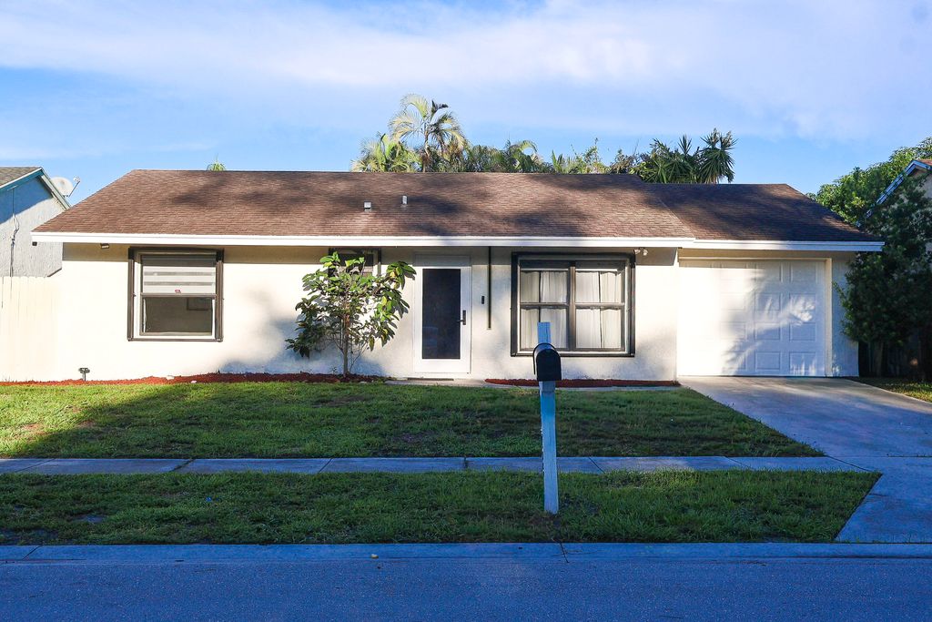 Photo of 5905 Triphammer Road, Lake Worth, FL 33463 (MLS # R11124968)