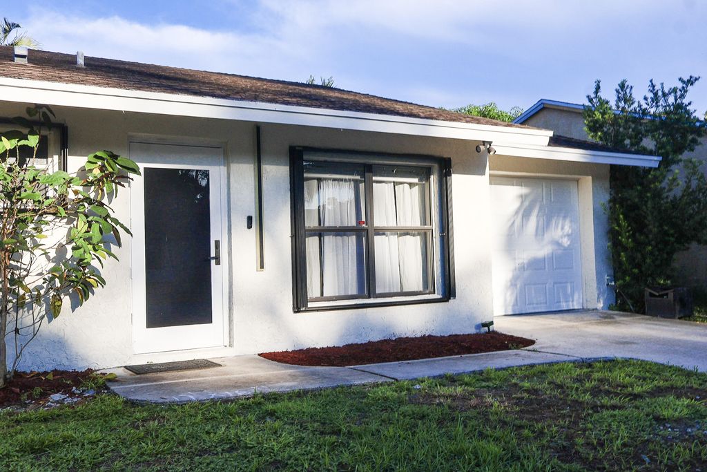 Photo of 5905 Triphammer Road, Lake Worth, FL 33463 (MLS # R11124968)