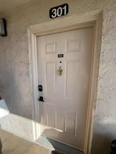 Photo of 9300 SW 8th Street #301, Boca Raton, FL 33428 (MLS # R11160474)