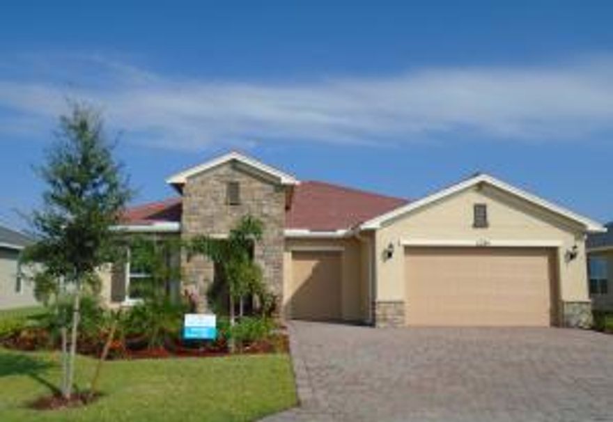 NEW HOME with BEAUTIFUL WATER VIEWS READY TO BE CALLED HOME NOW!  Come see how great it is to live the Active Resort Style Living in Vitalia at Tradition! Enjoy the New 24,000 SQ FT Clubhouse and Amenities Center, the Captiva Club.  This PALM COAST with Golf Cart Garage Model Home is the perfect for Entertaining and/or Relaxing.   Enjoy the Luxury Features of today - 42" Cabinets, Granite Countertops, 9 to 11 ft Ceilings, Brick Pavers, and Energy Efficient Features that you will enjoy for years to come!  See how this home works for you - We are open Monday-Saturday 9:30am - 5:30pm and Sunday 11:30am - 5:30pm.