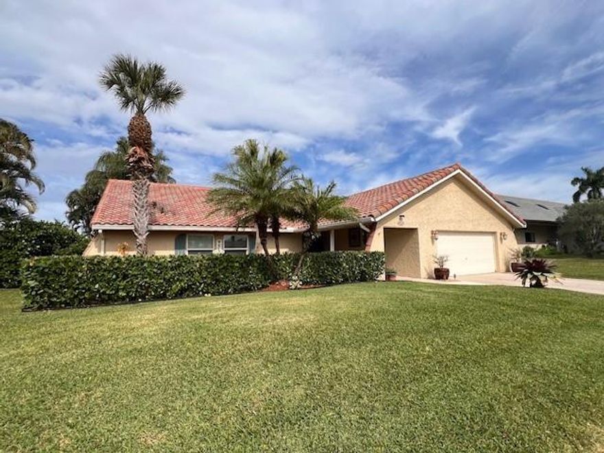 WELCOME TO THIS BEAUTIFUL HOME IN DESIRABLE DEER CREEK COUNTRY CLUB! THIS SPACIOUS 3/2 WITH A POOL ON THE LAKE IS PERFECT FOR ENTERTAINING. BRIGHT OPEN FLOOR PLAN WITH BOTH THE LIVING ROOM & THE FAMILY ROOM OPENING TO THE SCREENED-IN POOL, PATIO & LAKE. THERE'S ALSO AN OPEN PATIO WITH A FIRE PIT OVERLOOKING THE LAKE. THIS REMODELED HOME HAS A SPACIOUS KITCHEN WITH TOP OF THE LINE APPLIANCES, A DINING ROOM AREA WITH BUILT-IN WINE CHILLER & AN EAT-IN KITCHEN AREA. 24"x48" TILE FLOORS THRUOUT. VAULTED CEILINGS. TWO-SIDED OPEN FIREPLACE & OPEN WET BAR. PRIMARY BEDROOM OVERLOOKS THE LAKE & HAS A WALK-IN SPA-LIKE SHOWER & LARGE WALK-IN CLOSET. BOTH BATHROOMS REMODELED. IMPACT GLASS & DOORS. GOLF COURSE MEMBERSHIP AT DEER CREEK CC IS OPTIONAL. JUST A SHORT DRIVE TO THE BEACH, DINING & SHOPS!!