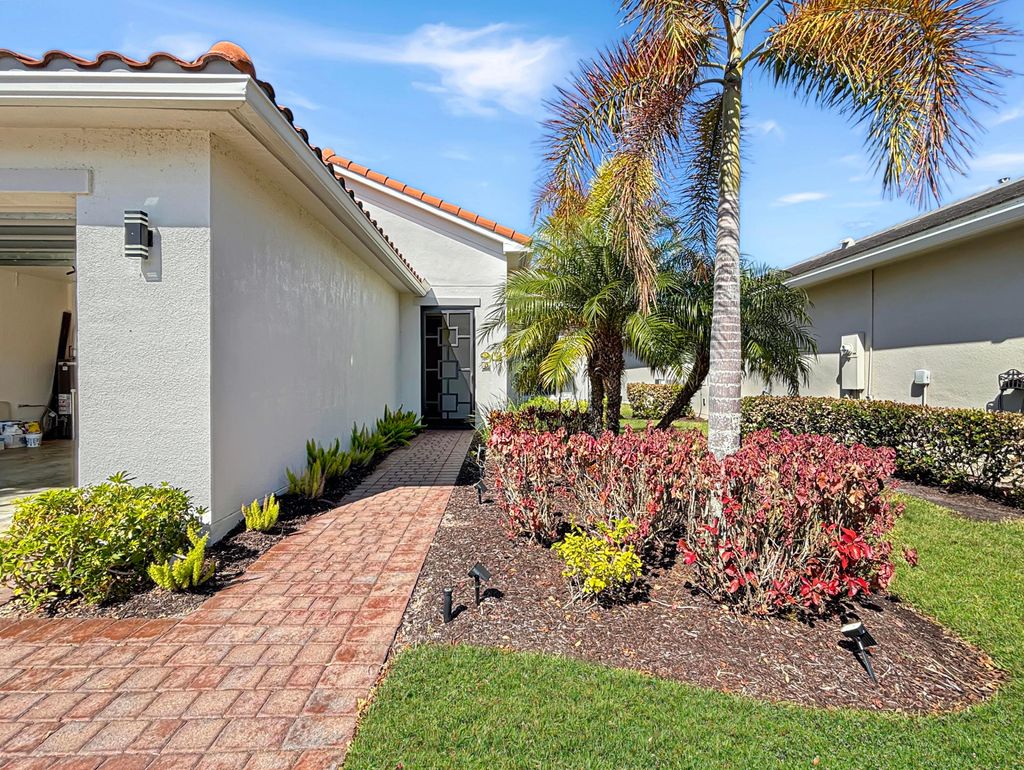 Photo of 9870 SW Trumpet Tree Circle, Port Saint Lucie, FL 34987 (MLS # R11162514)