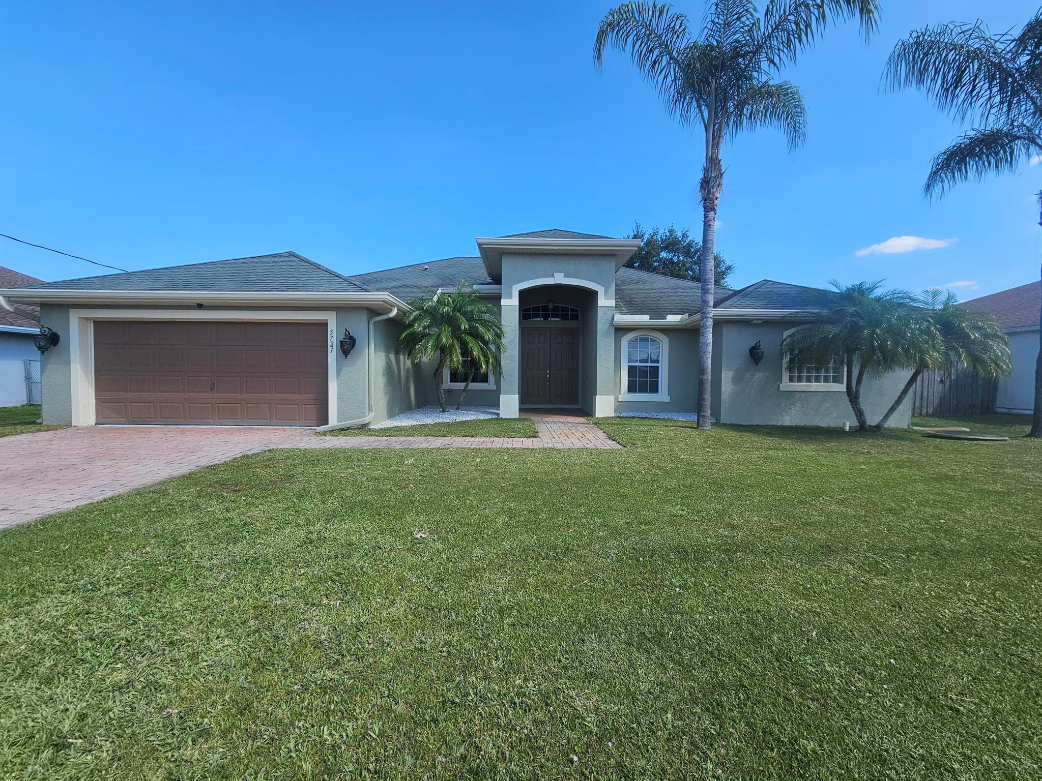 The motivated seller is offering *2.5% seller credit* for closing costs and prepaids on a full-price offer!Assumable 2.75% Mortgage Available!, Consult your preferred lender today!*1-year Home Warranty!*No HOA dues*, *New Roof Coming Soon* Discover your dream home in the desirable Torino area! This stunning 3-bedroom, 3-bathroom residence features a versatile Den/Office that can easily convert to a 4th bedroom-perfect for families. Step inside to find soaring ceilings and an open layout with two spacious living areas, ideal for gatherings. The gourmet kitchen is a chef's delight, complete with a breakfast bar and top-tier appliances, a convenient location near St. Lucie West makes this an unbeatable opportunity. Don't miss out--schedule your showing today!
