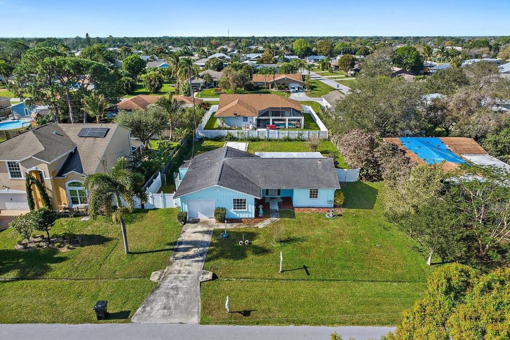 Photo of 2450 SE Sidonia Street, Port Saint Lucie, FL 34952 (MLS # R10960250)