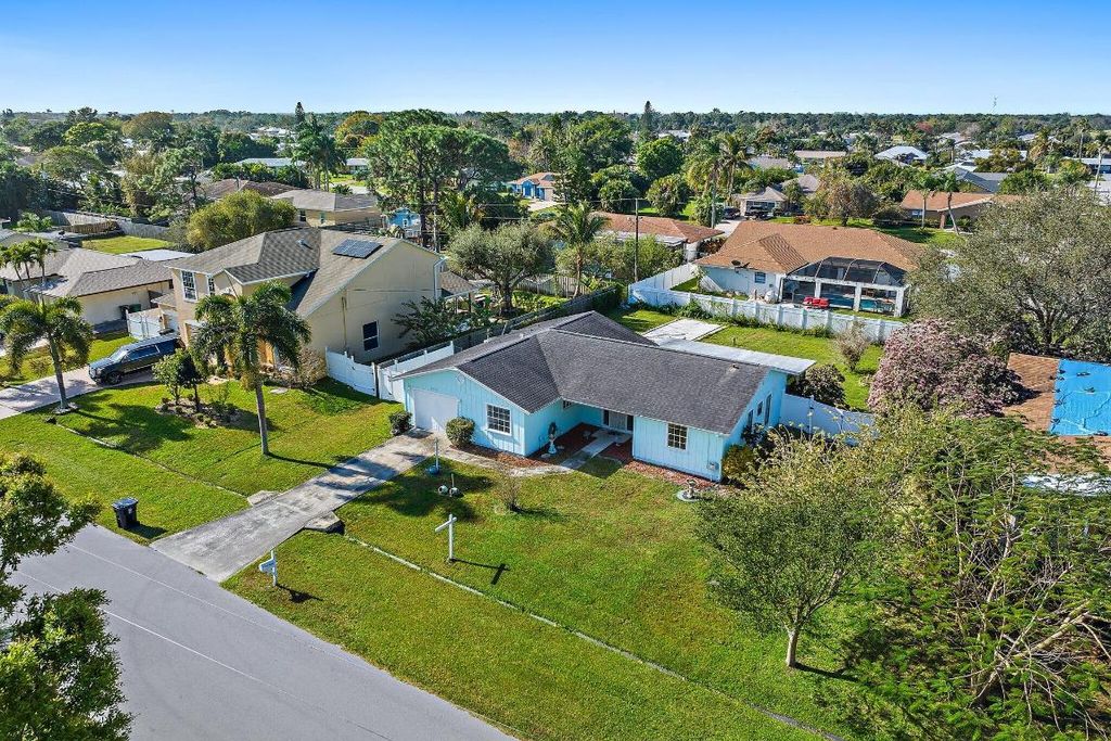 Photo of 2450 SE Sidonia Street, Port Saint Lucie, FL 34952 (MLS # R10960250)