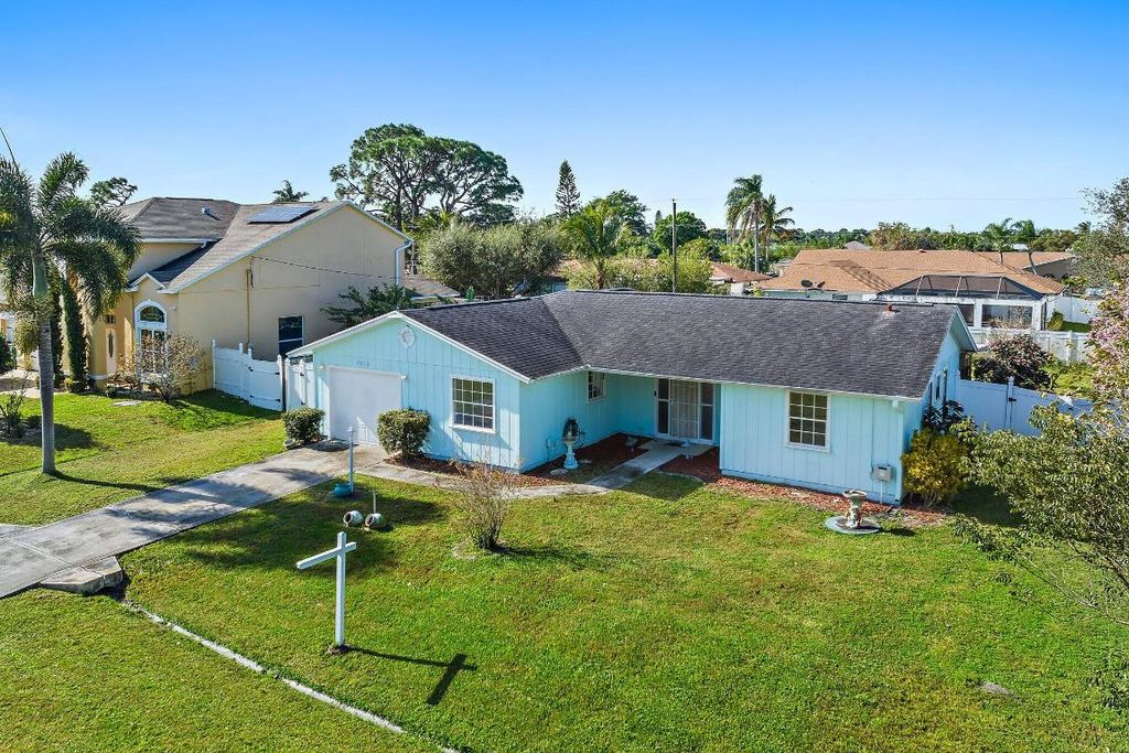 Photo of 2450 SE Sidonia Street, Port Saint Lucie, FL 34952 (MLS # R10960250)