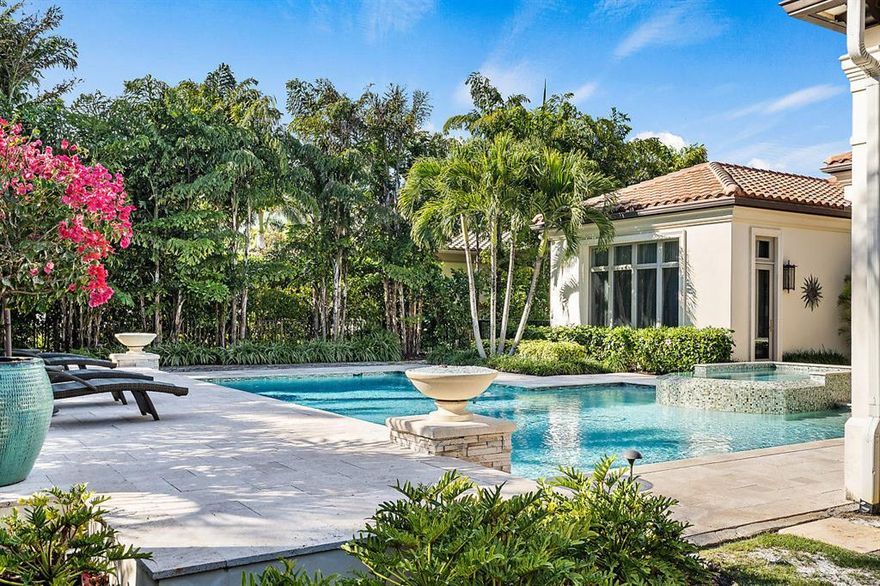 Breathtaking contemporary custom estate impeccably designed and professionally decorated. Endless luxurious details and finishes including top of the line appliances, 70 kw full house generator, Smart House Automation (Savant) and Lutron lighting system. Expansive circular driveway with dedicated parking pad and over sized 3 car garage with sink, cabinetry and air conditioned storage closet. The sprawling 1st floor includes marble and wood floors, custom built ins, walk in pantry, butler pantry, ample storage, his/her master baths large secondary bedrooms with en-suite bath, game room, custom fireplace, cabana bath, gracious summer kitchen and covered patio with phantom screens overlooking grand pool and 8 person spa with raised sun deck. Furnishings negotiable. Complete turnkey home.