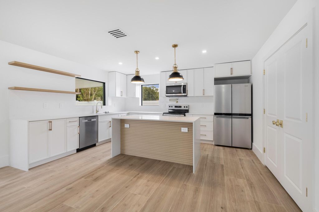 Photo of 1436 NE 37th Street, Oakland Park, FL 33334 (MLS # R11037434)