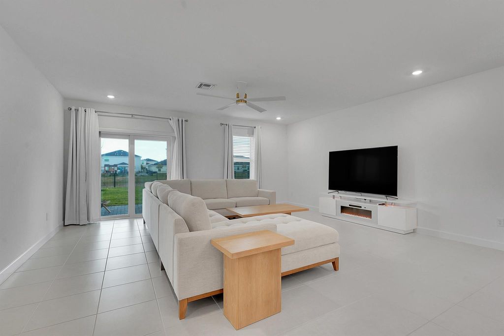 Photo of 6371 NW Windwood Way, Port Saint Lucie, FL 34987 (MLS # R11144332)