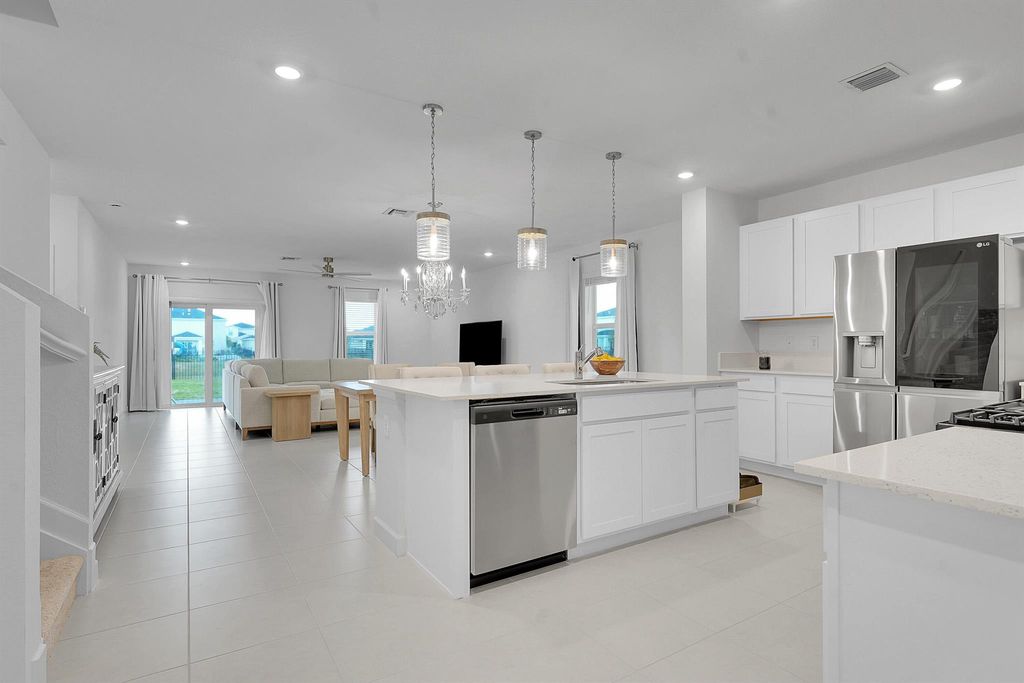 Photo of 6371 NW Windwood Way, Port Saint Lucie, FL 34987 (MLS # R11144332)