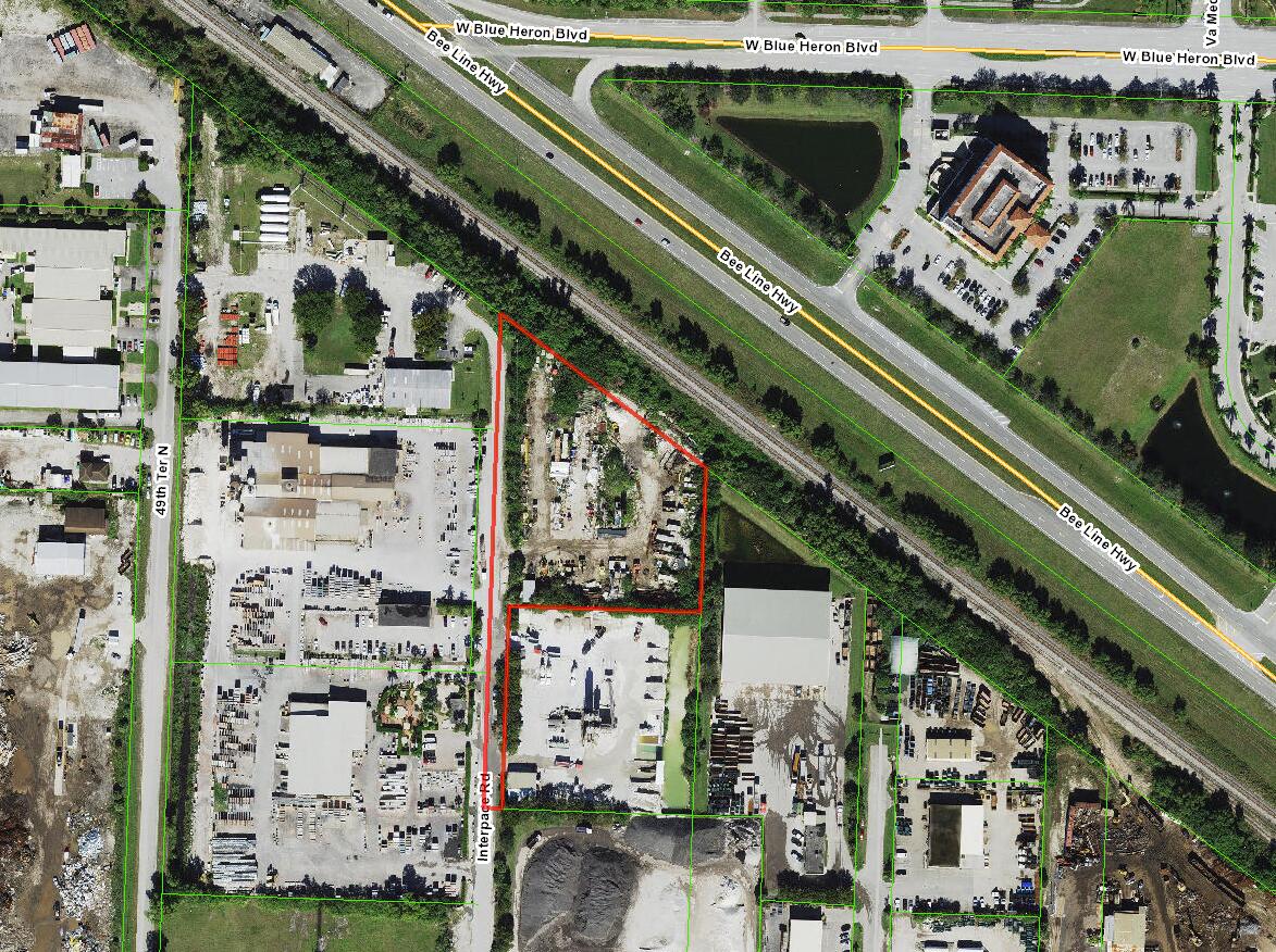 2.94 acres inclusive of ROW & 2.4 acres exclusive of the ROW ////PLEASE NOTE: The property address is shared with the property directly to the south. The property for sale abuts the Beeline and is outlined in red on the images. The ROW includes roadway and swale to the left of fenced-in area and extends south beyond the ingress/egress of the neighboring property to the south.///PROPERTY FEATURES:Rail spur off CSX line / 429 SF CBS building (33' x 13') on SW corner of lot. New roof. / Surface is asphalt millings on drivable area / 20,000 SF concrete pad in middle of premises / Small brick silo on premises / Currently a storage yard for marine industries contractor / City water, FPL, Septic / Fully chainlink fenced
