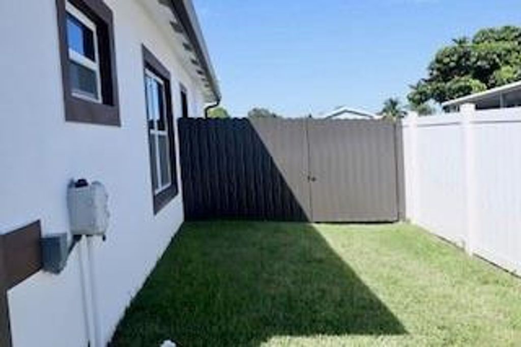 Photo of 220 SW Ridgecrest Drive, Port Saint Lucie, FL 34953 (MLS # F10534935)