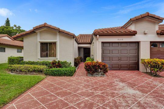 Photo of 6316 Kings Gate Circle, Delray Beach, FL 33484 (MLS # R10916507)