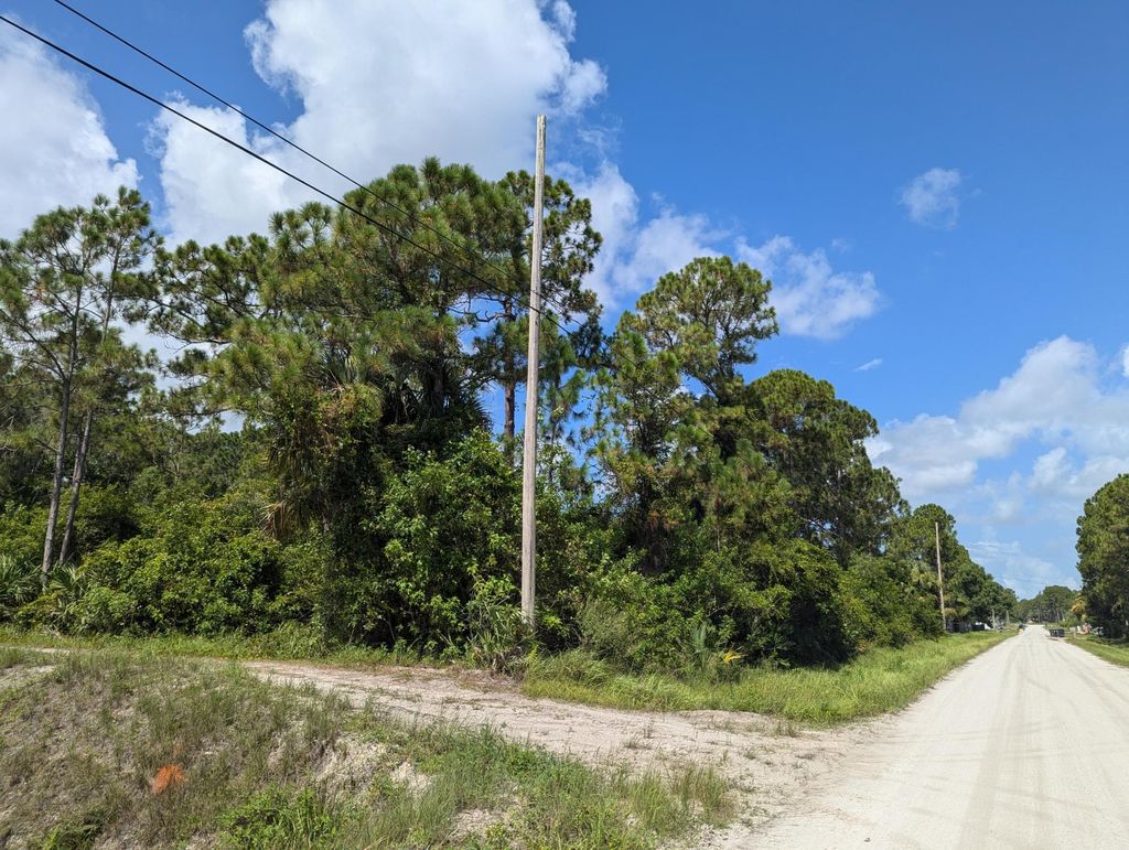 Photo of 392 76 Street N, The Acreage, FL 33470 (MLS # R11013834)