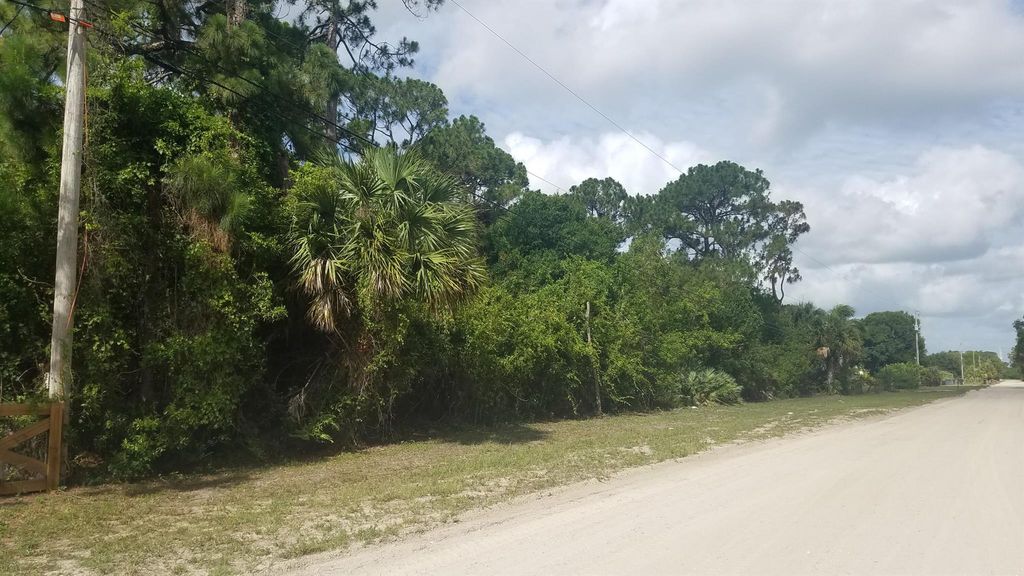 Photo of I-392 76 Street N, The Acreage, FL 33470 (MLS # R11013834)